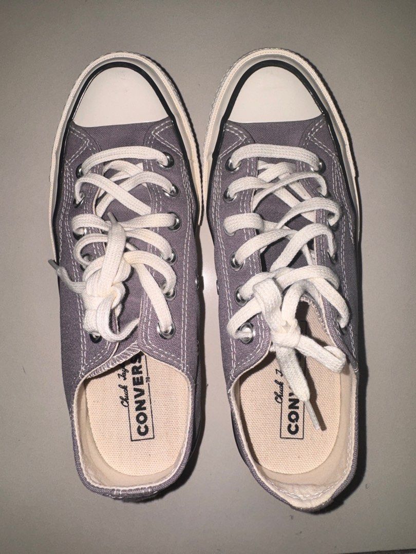 Converse Chuck Taylor All Star Low Top Sneakers (Category: Sneakers) located in Manila. Submitted by declutters137 (Listing ID 1440080883, Image 1). Description: - Classic Converse Chuck Taylor All Star low top sneakers - Cool purple grey color - Iconic Chuck Taylor branding on insole - Converse All Star logo on durable rubber outsole - Perfect for everyday wear - Adds a touch of retro style to any outfit Used only twice. Fit is too tight on me A