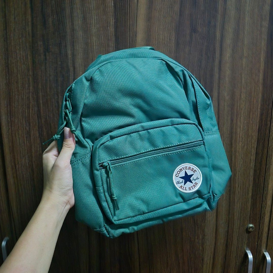 Converse Dark Green Mini Backpack (Category: Backpacks) located in Manila. Submitted by mho.marie (Listing ID 1440099367, Image 1). Description: Original Converse Backpack Actual color in person is dark green Good for back to school, has mini pocket inside (Please see photo).