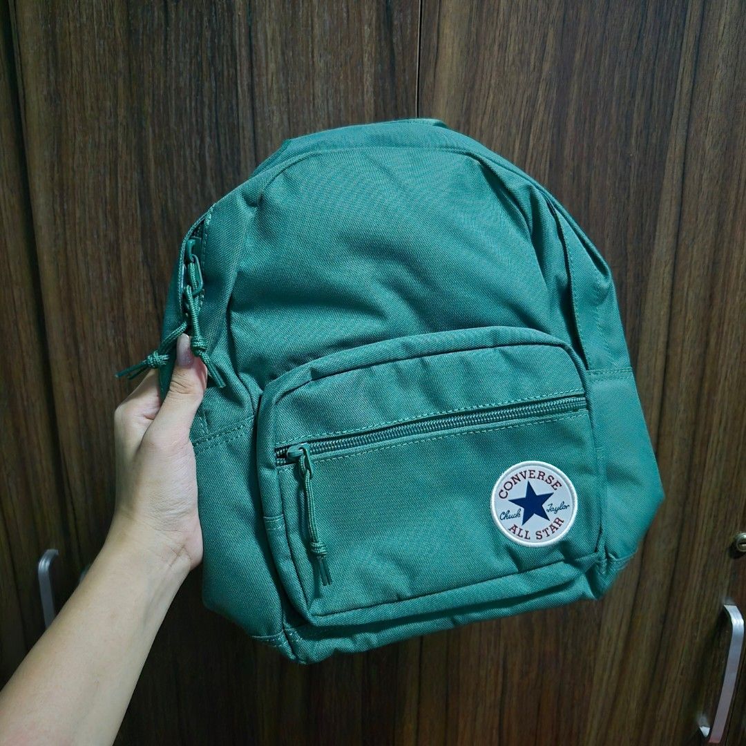 Converse Dark Green Mini Backpack (Category: Backpacks) located in Manila. Submitted by mho.marie (Listing ID 1440099367, Image 2). Description: Original Converse Backpack Actual color in person is dark green Good for back to school, has mini pocket inside (Please see photo).