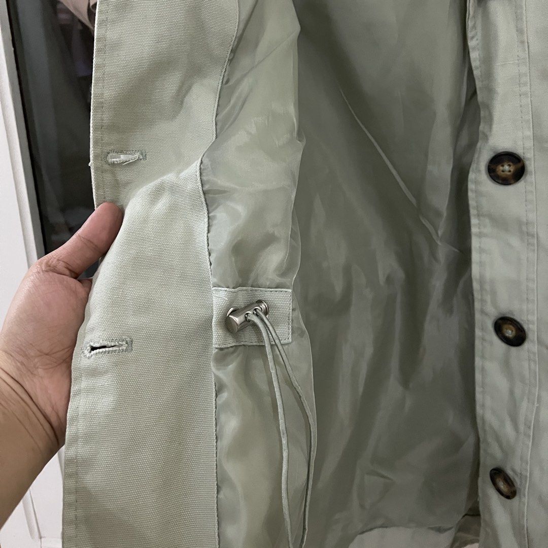 Cotton traders Cargo Jacket Drawstring Waist (Category: Coats, Jackets and Outerwear) located in Manila. Submitted by warmearth_55336e (Listing ID 1440192895, Image 3). Description: - Adjustable drawstring waist for a customized fit - Features two front pockets and a convenient chest zip pocket - Secure button and zip closure - Ideal for versatile layering Color varies due to lighting .