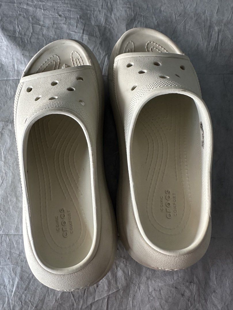 Crocs Platform Slide Sandals Beige (Category: Flats & Sandals) located in Paranaque City. Submitted by amedjugorje (Listing ID 1440124761, Image 2). Description: - used but not abused - size M5 | W7 - Trendy beige platform slide sandals from Crocs - Features the iconic Crocs comfort footbed - Stylish platform sole for added height and fashion - Perfect for everyday wear, beach trips, and casual outings - Easy slip-on, slip-off design for convenie