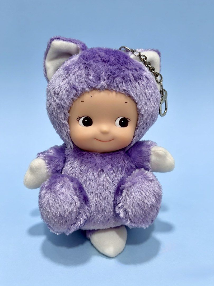 Cute Purple Cat Plush Toy Keychain (Category: Plushies & Soft Toys) located in Cebu City. Submitted by jessacelo30916 (Listing ID 1440134067, Image 1). Description: - Adorable purple plush toy - Features cute cat ears - Comes with a keychain attachment - Perfect for decorating bags or keys - Soft and charming design.