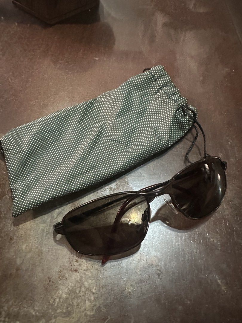 Dark Sunglasses with Green Polka Dot Pouch (Category: Sunglasses & Eyewear) located in Manila. Submitted by clamchowder19 (Listing ID 1440056260, Image 1). Description: - Stylish dark sunglasses - Sleek frame and tinted lenses - Optimal sun protection - Comes with a green polka dot drawstring pouch - Perfect for everyday wear and outdoor activities.