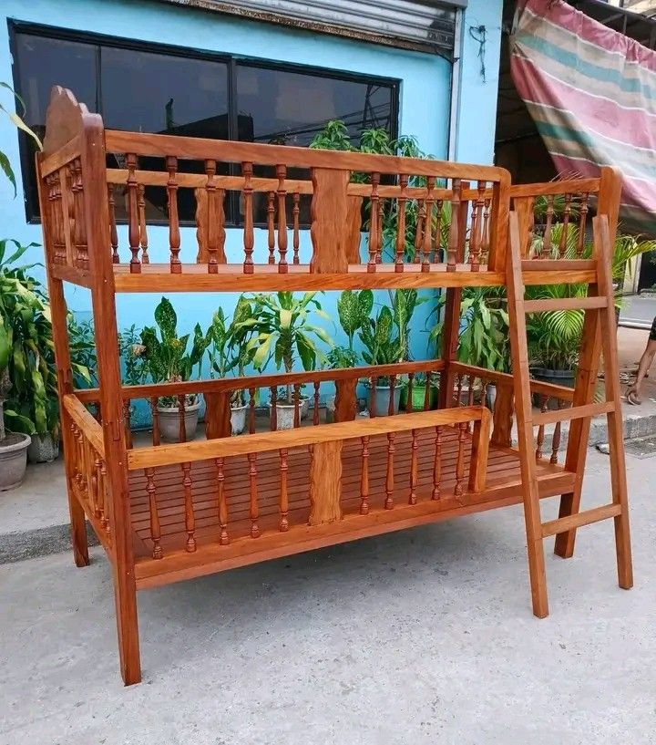 Double deck bed (Category: Bed Frames & Mattresses) located in Manila. Submitted by carmelites36250 (Listing ID 1440103895, Image 2). Description: Single Double Deck Bed made of mixed Narra and Mahogany Wood. Restored and revarnished. Ready to use for only P14,450. Size L74 x W36.
