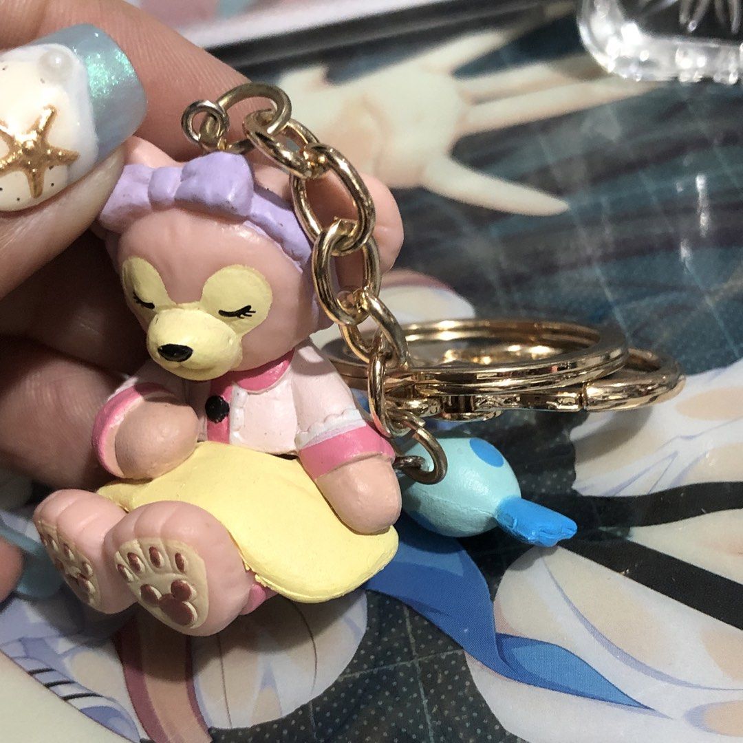 DUFFY THE DISNEY BEAR KEYCHAIN (Category: Character Goods) located in Quezon City. Submitted by kitsune.treasures (Listing ID 1440155316, Image 3). Description: *First to pay policy! *1 day reservation only. Failure to pay on time, auto cancel. 📍Quezon City * MOD: J&T | Lalamove * MOP: GCASH | BPI 📦ON HAND AND READY TO SHIP CONDITION: WHAT YOU SEE IS WHAT YOU GET. Dimensions: Kindly check the photos for the actual measurements. Please check all
