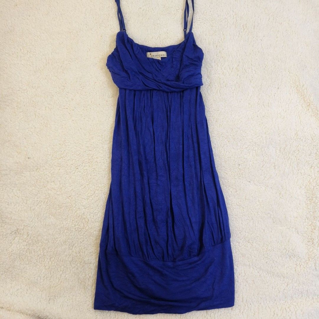 Forever 21 Blue Spaghetti Strap Ruched Dress (Category: Dresses) located in Echague. Submitted by ribbitpicks (Listing ID 1440175315, Image 1). Description: - Chic blue spaghetti strap dress - Brand: Forever 21 - Features: Flattering ruched bodice, gathered hemline - Fit: Adjustable straps for comfort - Occasion: Perfect for casual outings or a night out.