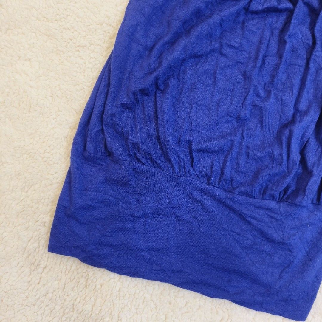 Forever 21 Blue Spaghetti Strap Ruched Dress (Category: Dresses) located in Echague. Submitted by ribbitpicks (Listing ID 1440175315, Image 3). Description: - Chic blue spaghetti strap dress - Brand: Forever 21 - Features: Flattering ruched bodice, gathered hemline - Fit: Adjustable straps for comfort - Occasion: Perfect for casual outings or a night out.