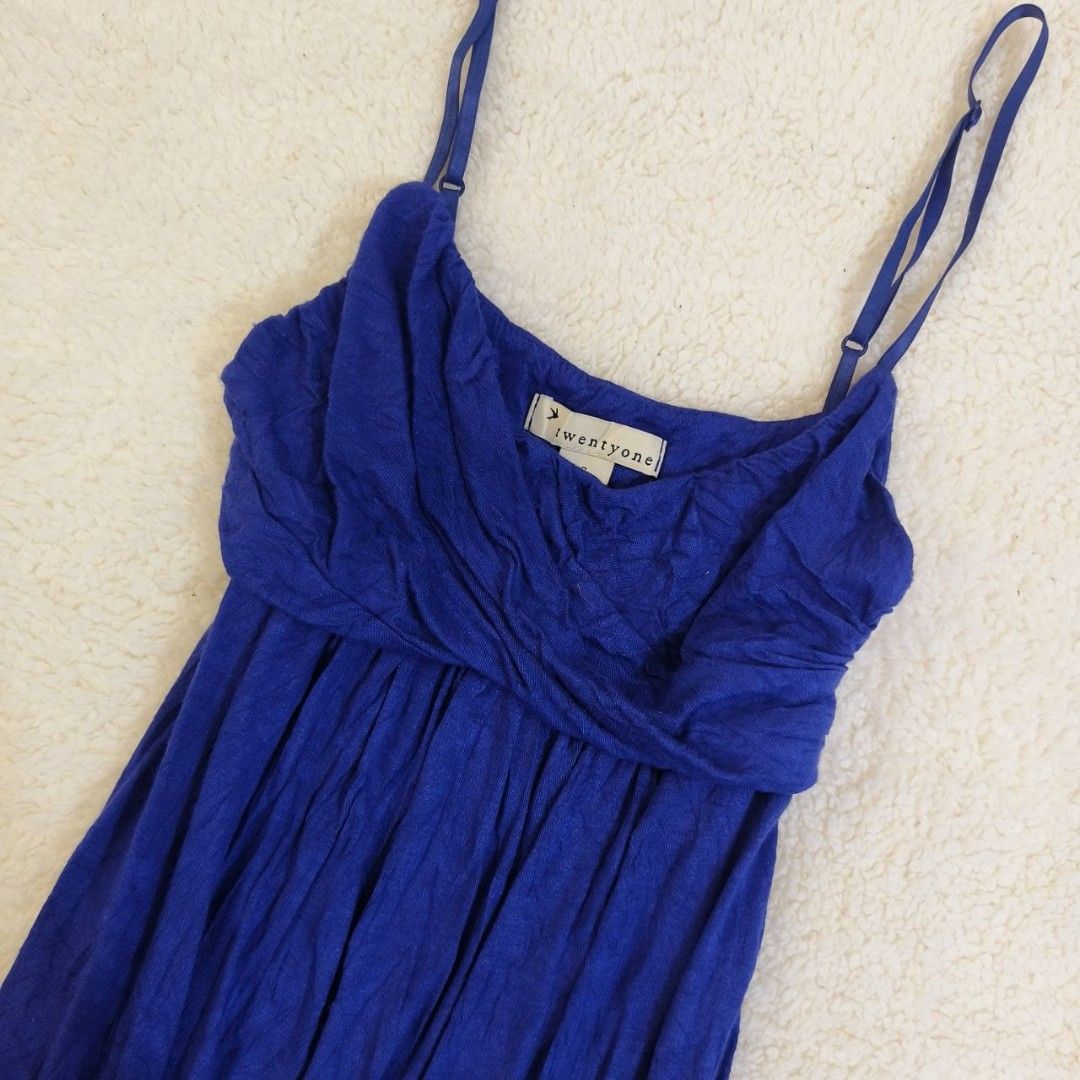 Forever 21 Blue Spaghetti Strap Ruched Dress (Category: Dresses) located in Echague. Submitted by ribbitpicks (Listing ID 1440175315, Image 2). Description: - Chic blue spaghetti strap dress - Brand: Forever 21 - Features: Flattering ruched bodice, gathered hemline - Fit: Adjustable straps for comfort - Occasion: Perfect for casual outings or a night out.
