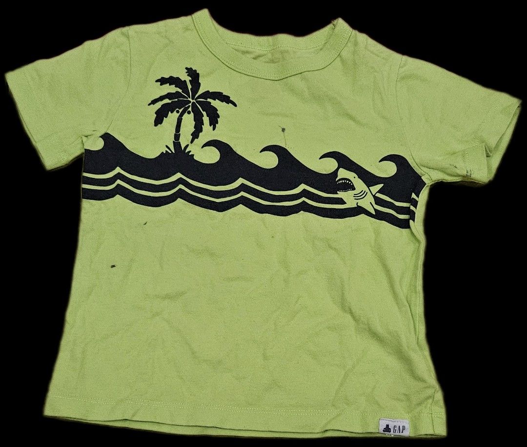 Gap Kids T-shirts and Pants Bundle (Category: Babies & Kids Fashion) located in Makati City. Submitted by xzyche (Listing ID 1440002206, Image 2). Description: - Bundle includes 4 Gap kids' apparel items. - P500 set Lime green t-shirt with palm tree and wave graphic. - 3 years old - P150 Navy blue t-shirt with large Gap logo - 2 years od - P150 Black pants with Gap logo. - 6-12 months - P200 Navy blue sweatpants with pink Gap logo. - 3 years old 