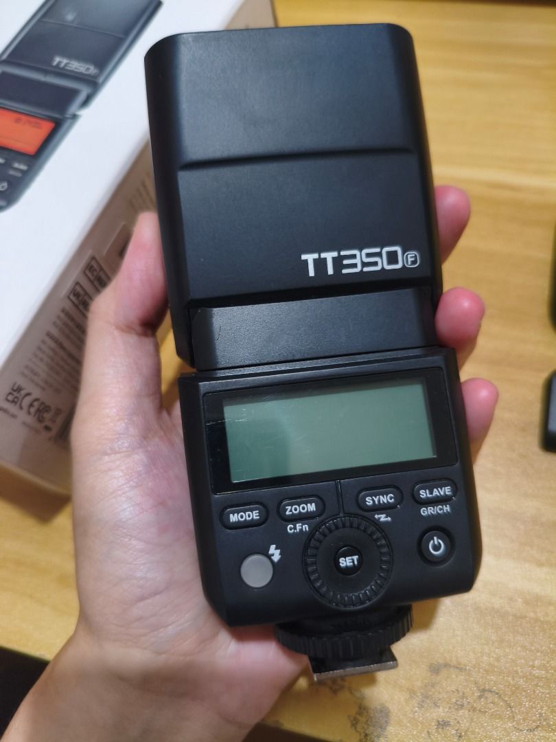 Godox TT350F FOR SALE (Category: Cameras) located in Malabon City. Submitted by jaitamayo (Listing ID 1440075133, Image 3). Description: Godox TT350F External Flash for Fujifilm Barely used, good condition Inclusions: ✅ Unit ✅ Box ✅ Pouch ✅ Stand ✅ Diffuser Price: ₱3,000 only! SRP neto is ₱3,990 RFS: Not in use Location: Malabon City / SM Grand Central, Monumento.