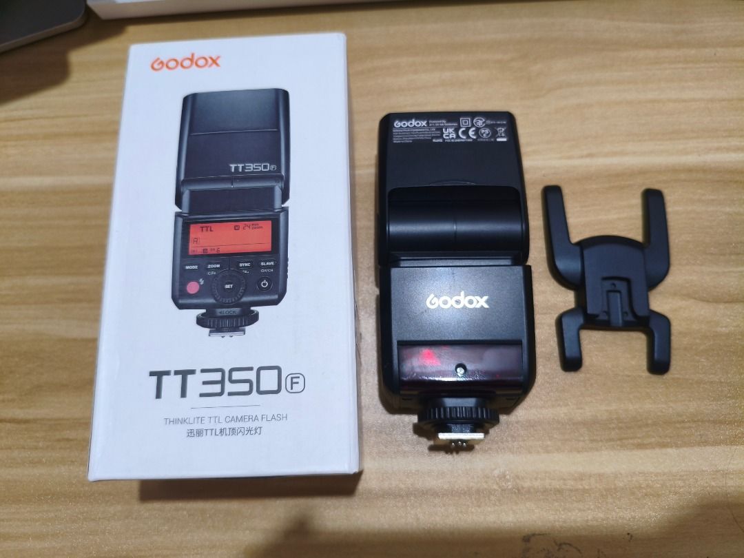 Godox TT350F FOR SALE (Category: Cameras) located in Malabon City. Submitted by jaitamayo (Listing ID 1440075133, Image 2). Description: Godox TT350F External Flash for Fujifilm Barely used, good condition Inclusions: ✅ Unit ✅ Box ✅ Pouch ✅ Stand ✅ Diffuser Price: ₱3,000 only! SRP neto is ₱3,990 RFS: Not in use Location: Malabon City / SM Grand Central, Monumento.