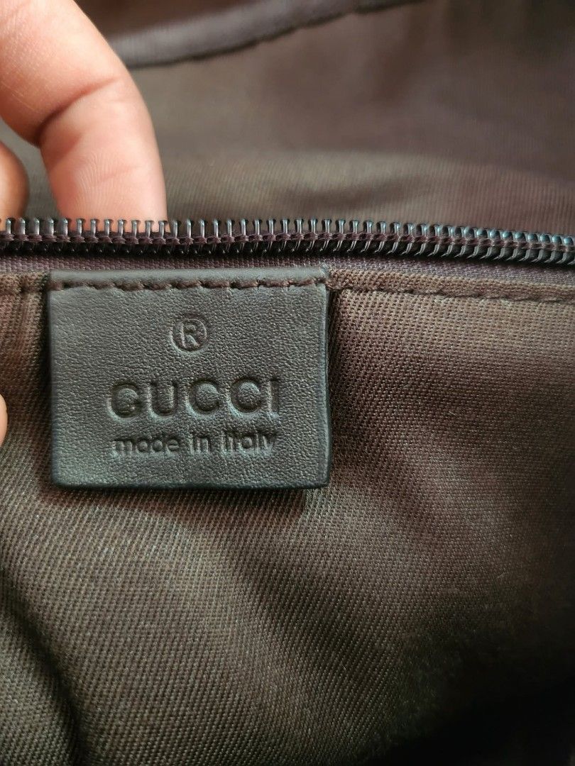 Gucci GG Supreme Large Interlocking G Backpack (Category: Luxury Bags & Wallets) located in Caloocan City. Submitted by xtrabaggageforsale (Listing ID 1439999815, Image 2). Description: New Arrival!!! In excellent preloved condition from Korea. Key Features Material: durable GG Supreme canvas paired with dark brown leather trim. Design Details: It includes a top flap with a circular interlocking G leather patch, dual web shoulder straps with buck