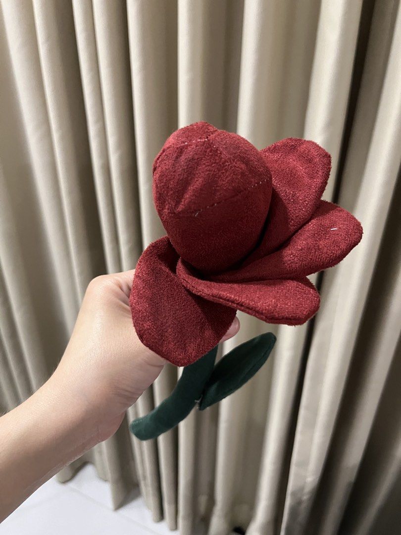 Handmade Plush Red Rose Toy (Category: Plushies & Soft Toys) located in Quezon City. Submitted by saleinqc (Listing ID 1439996217, Image 2). Description: - Charming handmade plush toy - Shaped like a beautiful red rose - Features soft, velvety petals in deep red - Includes a green stem with a leaf detail - Ideal for decoration, gifting, or as a cuddly friend.