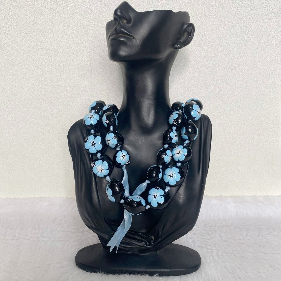 Hawaii Polished Black Kukui Nut Blue Hibiscus Flowers Leis Necklace (Category: Necklaces) located in Cebu City. Submitted by posh_avenue888 (Listing ID 1440111937, Image 1). Description: In very good condition. From Japan. 34 inches..