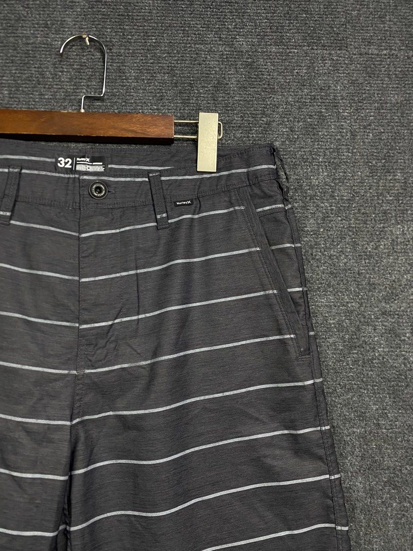 Hurley Striped Board Shorts Size 32 (Category: Swim Trunks & Board Shorts) located in Bolinao. Submitted by frenced28 (Listing ID 1440162480, Image 2). Description: Waistline:34, length:22 - Brand: Hurley - Type: Board Shorts - Size: 32 on tag - Color: Dark Grey with White Horizontal Stripes - Ideal for: Beach, pool, summer activities.
