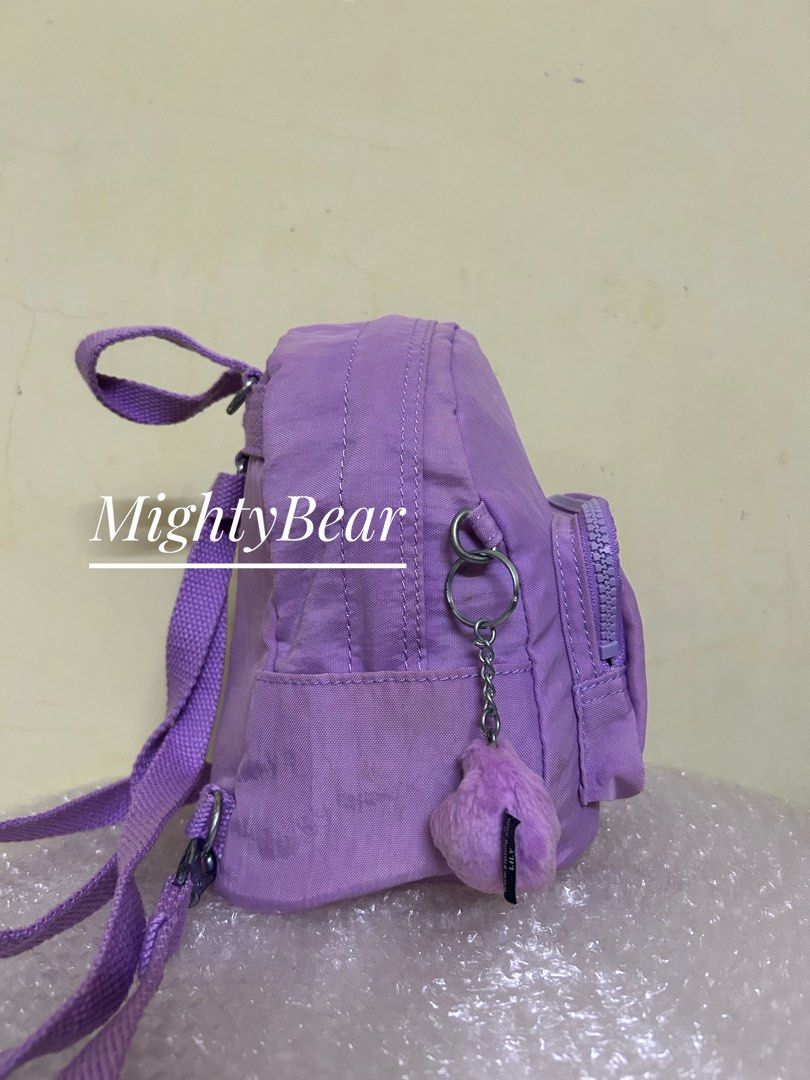 Kipling (Category: Backpacks) located in Ipoh. Submitted by mightybear_500 (Listing ID 1440151865, Image 3). Description: Kipling (nano) Kipling mini backpack in a light purple or lavender shade. Mini backpack ni size kecil, nano...adult n anak2 boleh pakai...tali boleh adjust...dengan tali yang sama, boleh dijadikan sebagai sling bag. Inch: L6.13xH8.6xW3.7 .