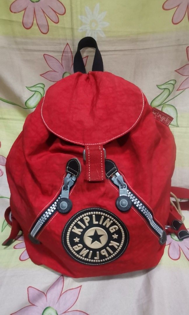 329 KIPLING Red backpack bag (Category: Backpacks) located in Baguio. Submitted by princessjhade (Listing ID 1440059224, Image 1). Description: Medium to large No monkey na Very good condition Plus shipping.