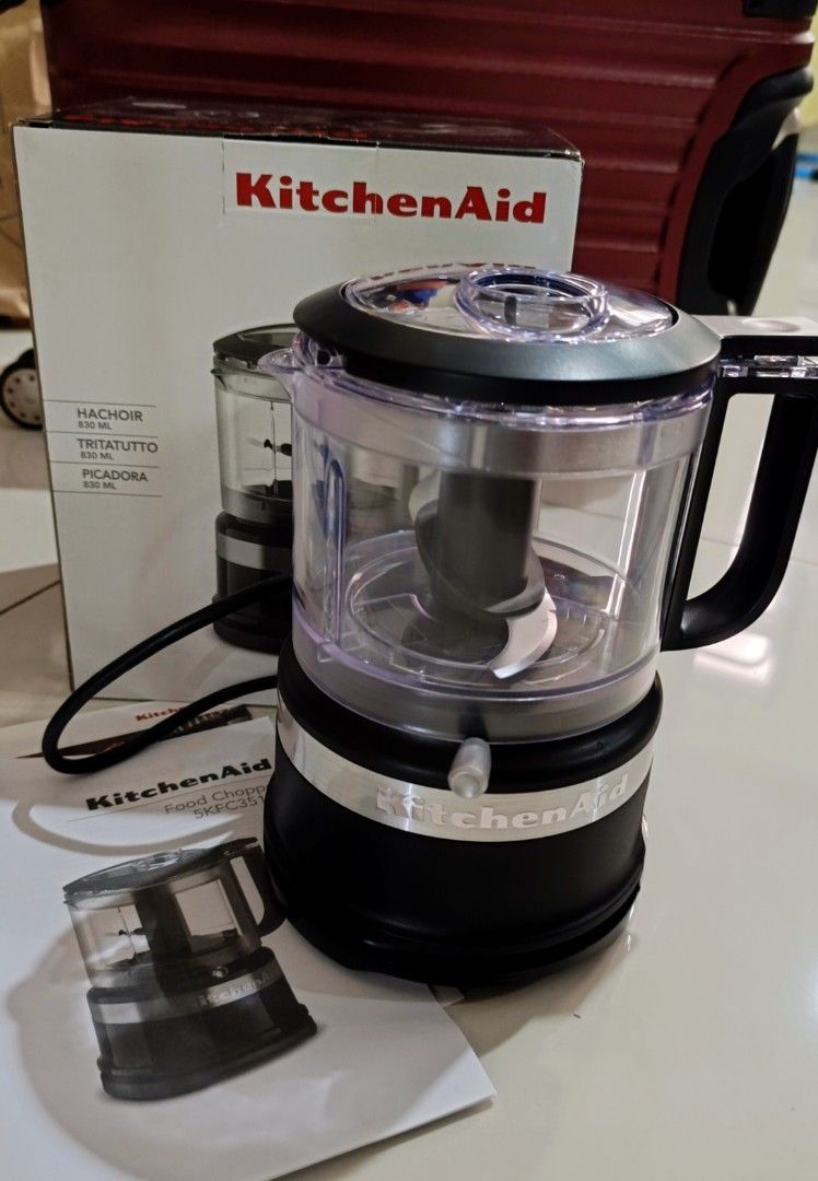 KitchenAid Food Chopper 3.5 Cup Black (Category: Other Kitchen Appliances) located in Quezon City. Submitted by disco_10 (Listing ID 1440001509, Image 1). Description: - KitchenAid 3.5 cup food chopper - Perfect for mincing, chopping, and pureeing ingredients - Compact and powerful design - Features sharp blades for efficient results - Transparent bowl for easy progress monitoring - Comes with original box and manual.