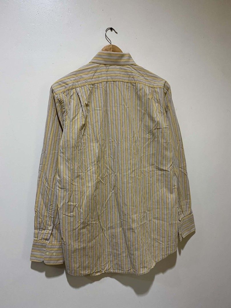 Lacoste Striped Long Sleeve Button Down Shirt Size 40 (Category: Tshirts & Polo Shirts ) located in Manila. Submitted by livehorse.542a4e (Listing ID 1440024527, Image 2). Description: - Classic Lacoste long-sleeved button-down shirt - Stylish yellow and grey stripe pattern - Designed in France, Made in Tunisia - dimes:L 29 W 21 brandnew condition - Perfect for smart casual or formal occasions - Versatile addition to any wardrobe.