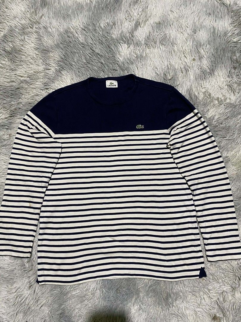 Lacoste Striped Long-Sleeved Shirt (Category: Activewear) located in General Santos City (Dadiangas). Submitted by winter09503 (Listing ID 1440096313, Image 1). Description: - Classic navy and white stripes - Long sleeves - Lacoste brand - Iconic embroidered crocodile logo on chest - Comfortable and stylish for everyday wear - Versatile for layering or wearing solo.