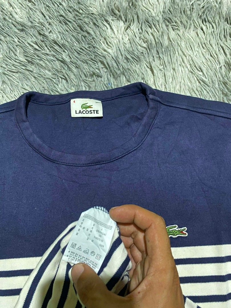Lacoste Striped Long-Sleeved Shirt (Category: Activewear) located in General Santos City (Dadiangas). Submitted by winter09503 (Listing ID 1440096313, Image 2). Description: - Classic navy and white stripes - Long sleeves - Lacoste brand - Iconic embroidered crocodile logo on chest - Comfortable and stylish for everyday wear - Versatile for layering or wearing solo.