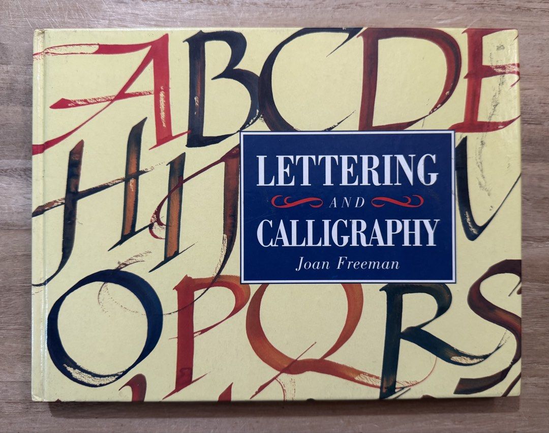 Lettering and Calligraphy - Joan Freeman (Category: Textbooks) located in San Pedro. Submitted by pageturner19 (Listing ID 1440149480, Image 1). Description: - Master lettering and calligraphy comprehensive guide. - Learn essential pen lettering techniques: equipment, paper prep, nib filling, and letter forms. - Explore drawn lettering, numerals, and decorative illumination. - Ideal for beginners and enthusiasts seeking to improve handwriting..