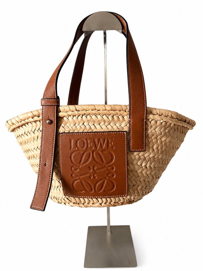 Loewe Raffia Basket Bag with Leather Handles (Category: Luxury Bags & Wallets) located in Manila. Submitted by shopgrl_ (Listing ID 1439993647, Image 1). Description: LOEWE Raffia Small Basket Bag – For Sale 🤎 Effortlessly chic and perfect for sunny days! Selling this beautiful LOEWE Raffia Small Basket Bag, gently used only a few times and still in excellent condition. ✨ Details: • Small size • Used only a few times • In excellent condition • C