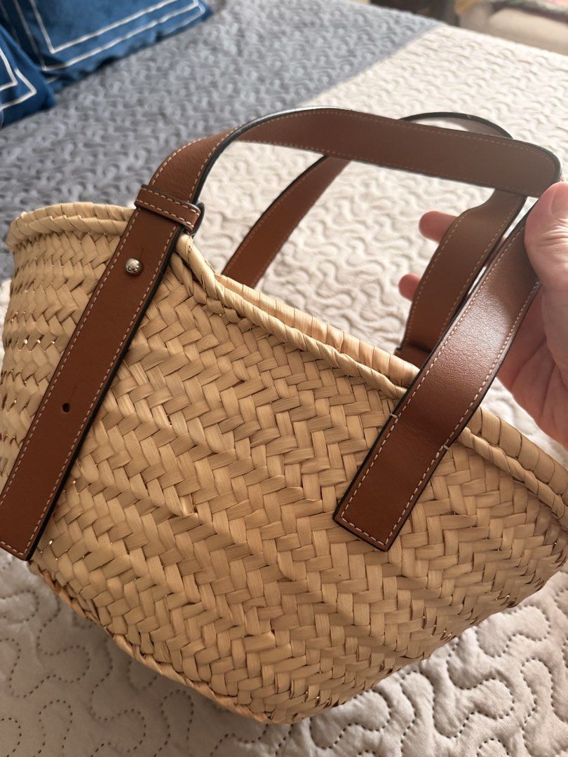 Loewe Raffia Basket Bag with Leather Handles (Category: Luxury Bags & Wallets) located in Manila. Submitted by shopgrl_ (Listing ID 1439993647, Image 2). Description: LOEWE Raffia Small Basket Bag – For Sale 🤎 Effortlessly chic and perfect for sunny days! Selling this beautiful LOEWE Raffia Small Basket Bag, gently used only a few times and still in excellent condition. ✨ Details: • Small size • Used only a few times • In excellent condition • C