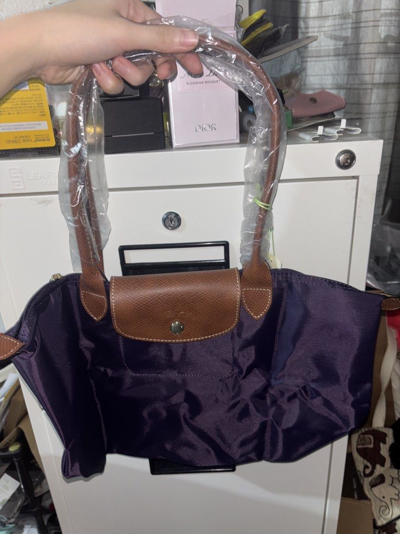 Longchamp Le Pliage (Category: Shoulder Bags) located in Cavite. Submitted by declutteringthingzz (Listing ID 1440126984, Image 2). Description: From Australia Purple Color Long handle .