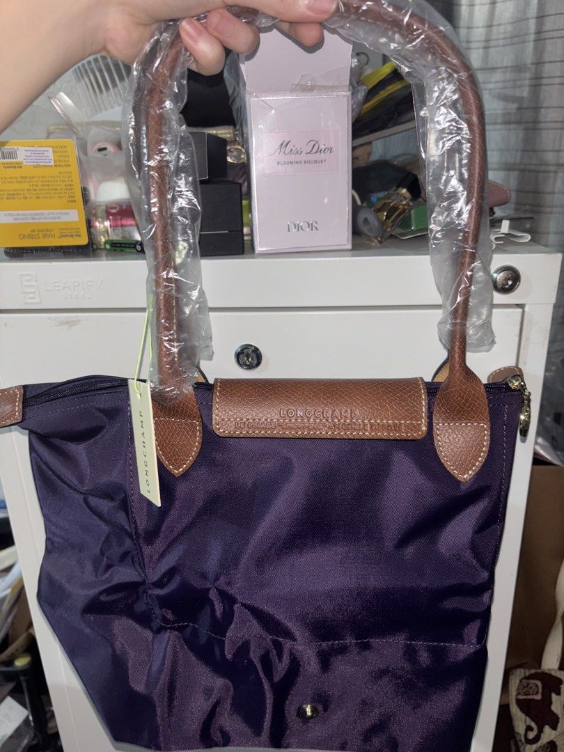 Longchamp Le Pliage (Category: Shoulder Bags) located in Cavite. Submitted by declutteringthingzz (Listing ID 1440126984, Image 3). Description: From Australia Purple Color Long handle .