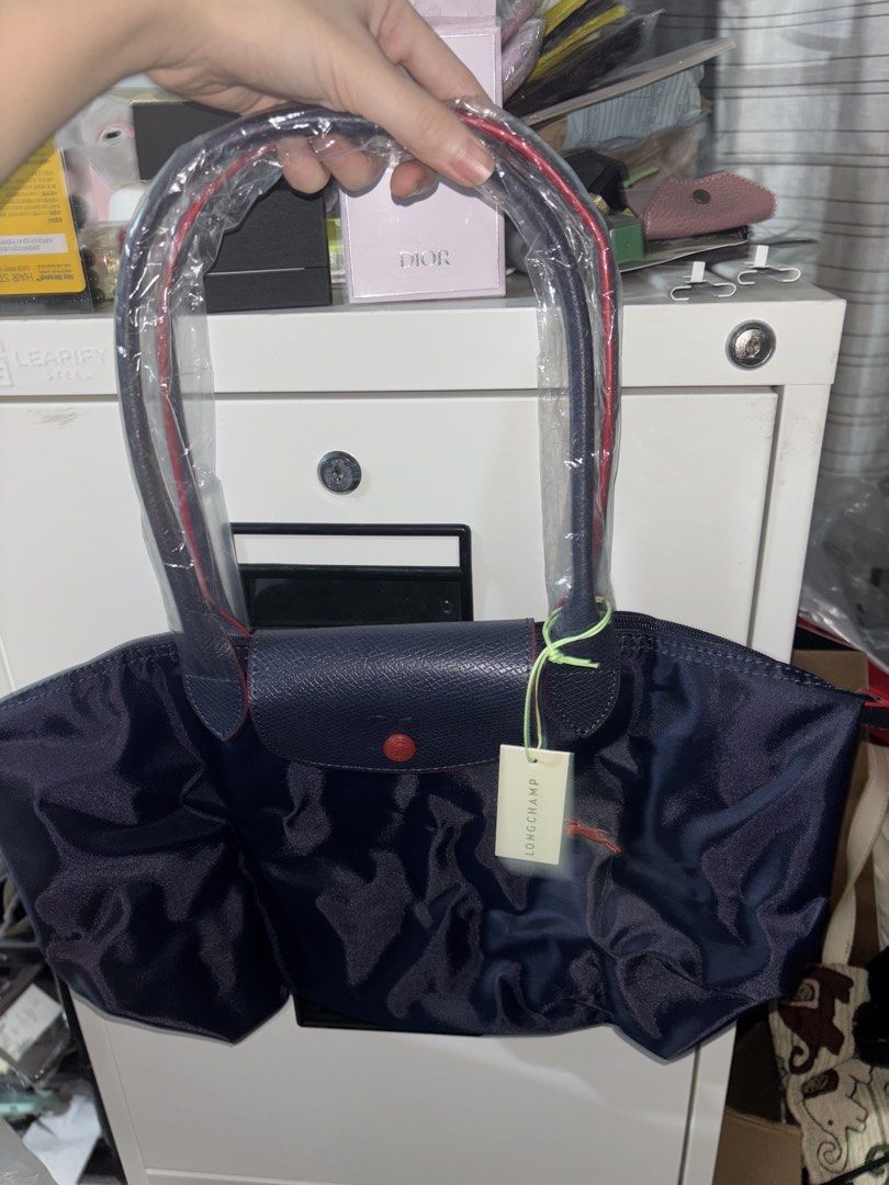 Longchamp Le Pliage Tote (Category: Tote Bags) located in Cavite. Submitted by declutteringthingzz (Listing ID 1440127234, Image 2). Description: From Australia Small in Navy Blue.