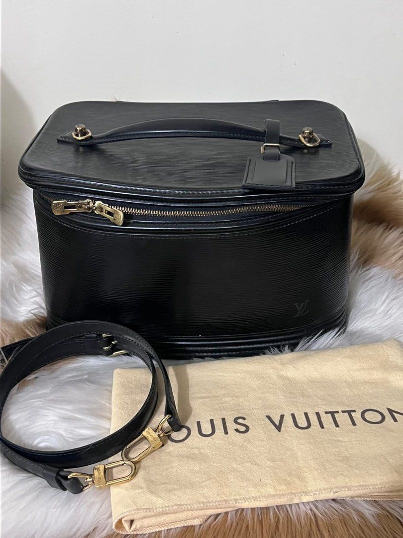 Louis Vuitton Epi Leather Vanity Case Black (Category: Luxury Bags & Wallets) located in Makati City. Submitted by lperu71 (Listing ID 1440113732, Image 1). Description: - Authentic Louis Vuitton vanity case - Black Epi leather - Top handle - Zip-around closure - Detachable shoulder strap - Comes with Louis Vuitton dust bag - Ideal for travel or everyday use Php 45,000 negotiable .