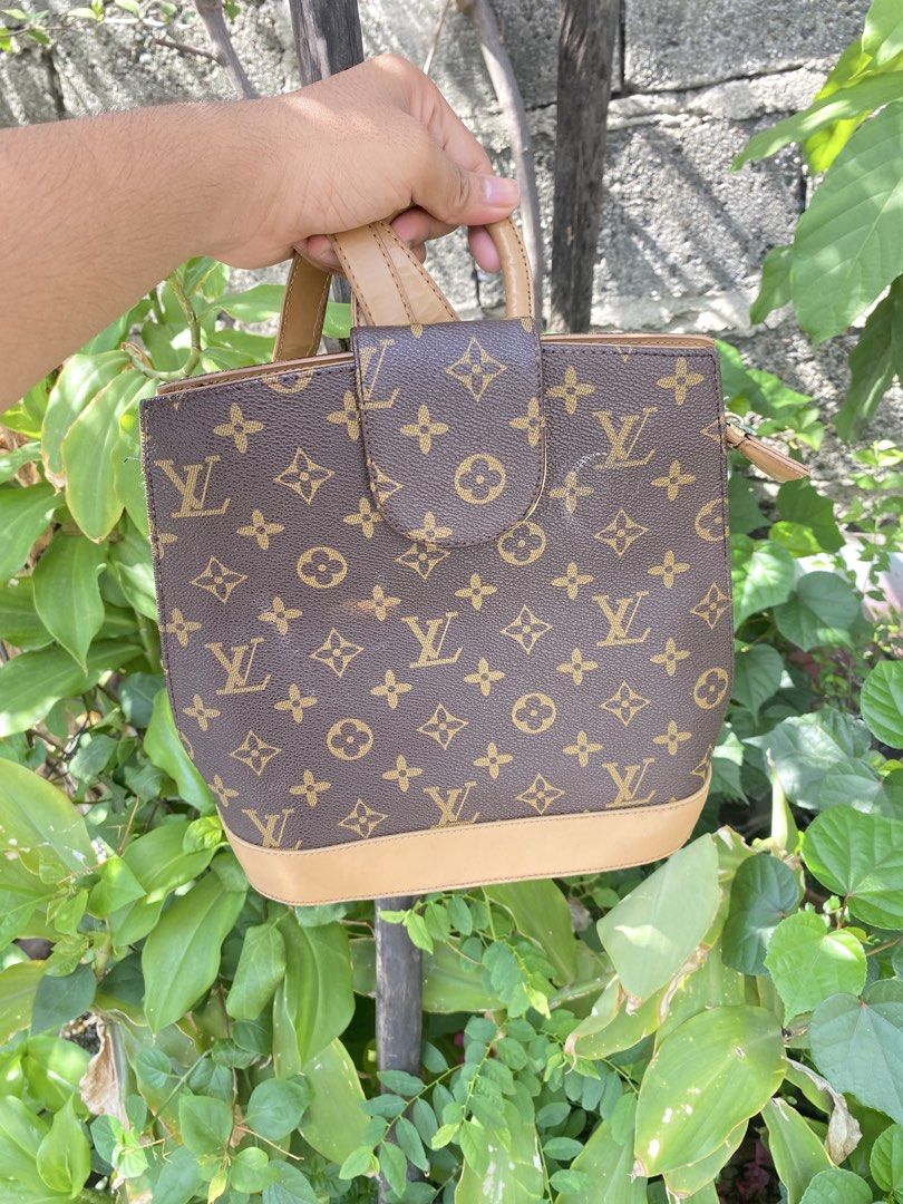 Louis Vuitton Monogram Canvas Backpack Bag (Category: Luxury Bags & Wallets) located in Bacolor. Submitted by paw_thrift (Listing ID 1440003069, Image 1). Description: - Authentic Louis Vuitton Monogram Backpack - Classic Monogram Canvas - Flap Closure - Adjustable Leather Straps - Interior Zippered Compartment - Made in France - Stylish and Practical for Everyday Use.