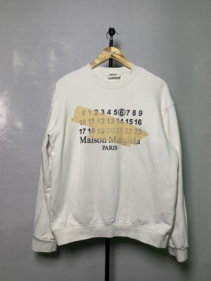 Maison Margiela White Sweater (Category: Luxury Apparel) located in Manila. Submitted by macadr1p (Listing ID 1440160761, Image 3). Description: MAISON MARGIELA Dimes: 24x27 Best fit: Large Color rate: 9.8/10 Condition: Excellent - Complete tags - Color not faded at all - Neckline not wide - Issue: minimal yellowish only - Need basic wash - High quality Fabrics - OVERALL💯 ✔ Premium fabric for all-day comfort ✔ Clean and versatile style ✔ Classic