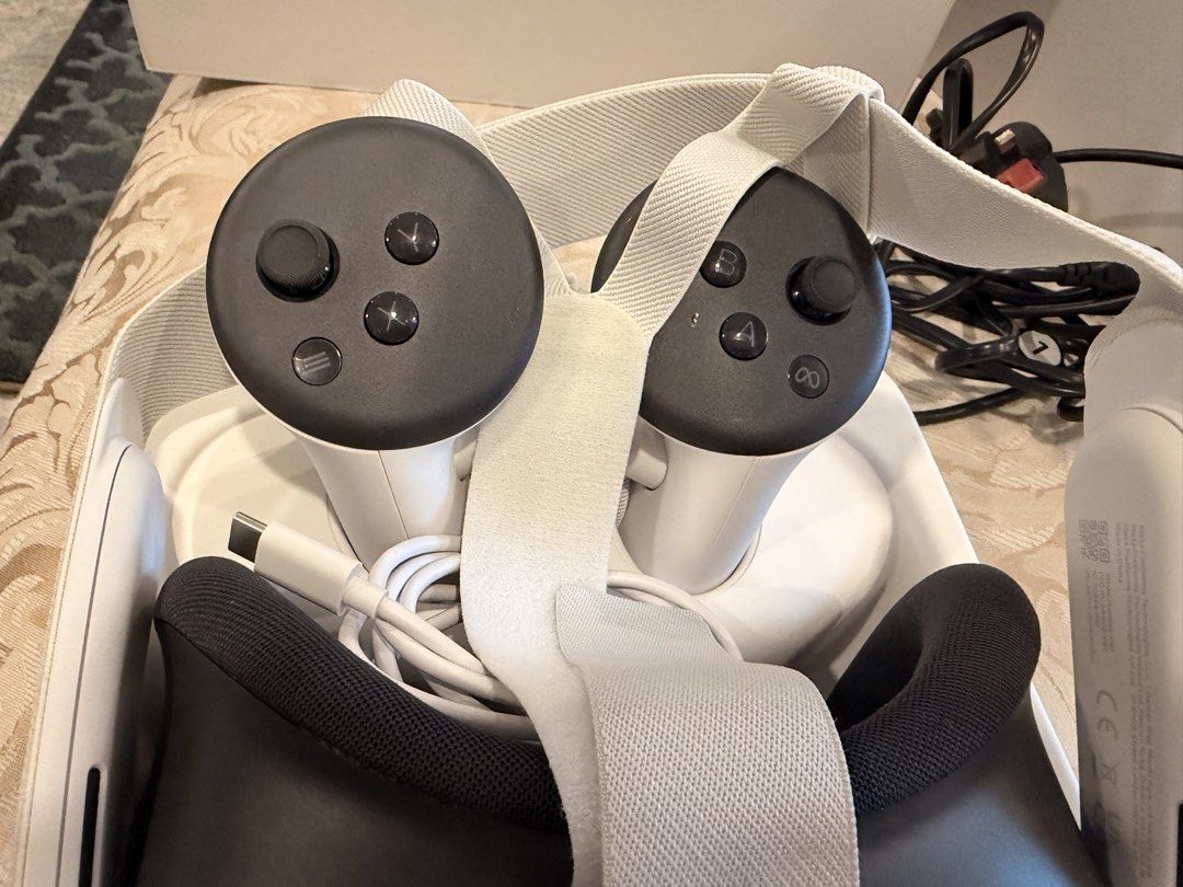 Meta quest VR2 (Category: Virtual Reality) located in Singapore. Submitted by divyanarul68597 (Listing ID 1440043074, Image 2). Description: Meta Quest 2 VR headset in excellent/pristine condition, lightly used only a few times. Comes complete with 2 controllers, charging cable and adapter. Perfect for VR gaming, fitness and entertainment. Fully functional and very well maintained..