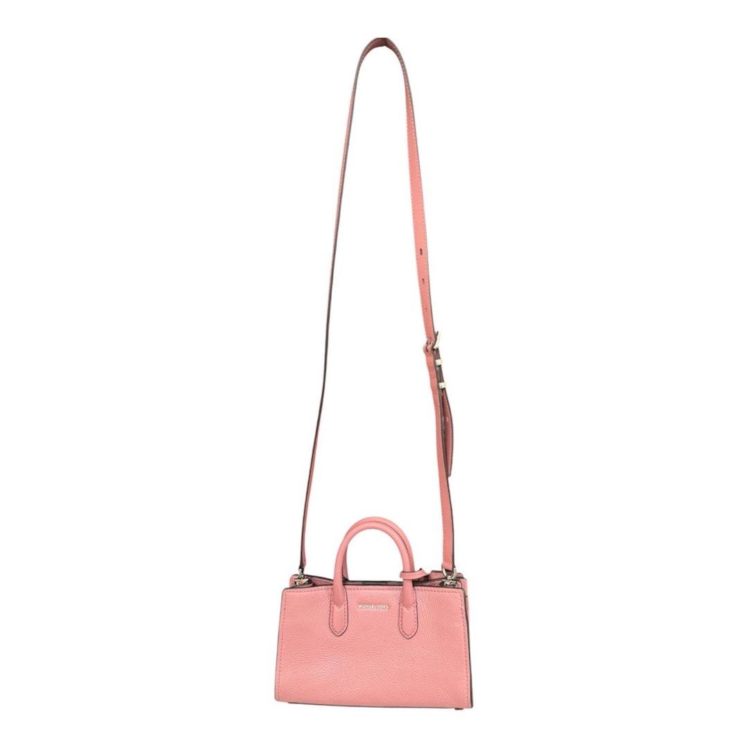Michael Kors Pink Leather Top Handle Bag (Category: Luxury Bags & Wallets) located in Bacolod City. Submitted by BellaCo (Listing ID 1440059247, Image 3). Description: Brandd New Sale at 3000 NEED TO DISPOSE ASAP ITEM IS COMPLETE WITH CARDS.
