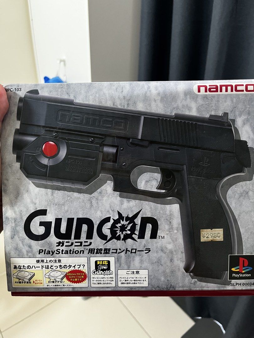 Namco GunCon PS1 Controller (Category: Controllers) located in Quezon City. Submitted by jahyan (Listing ID 1440154019, Image 1). Description: - Original Namco GunCon controller for PlayStation 1 - Model: NPC-103 - Designed for light gun games - Includes original box and protective packaging - Compatible with PS1 consoles.