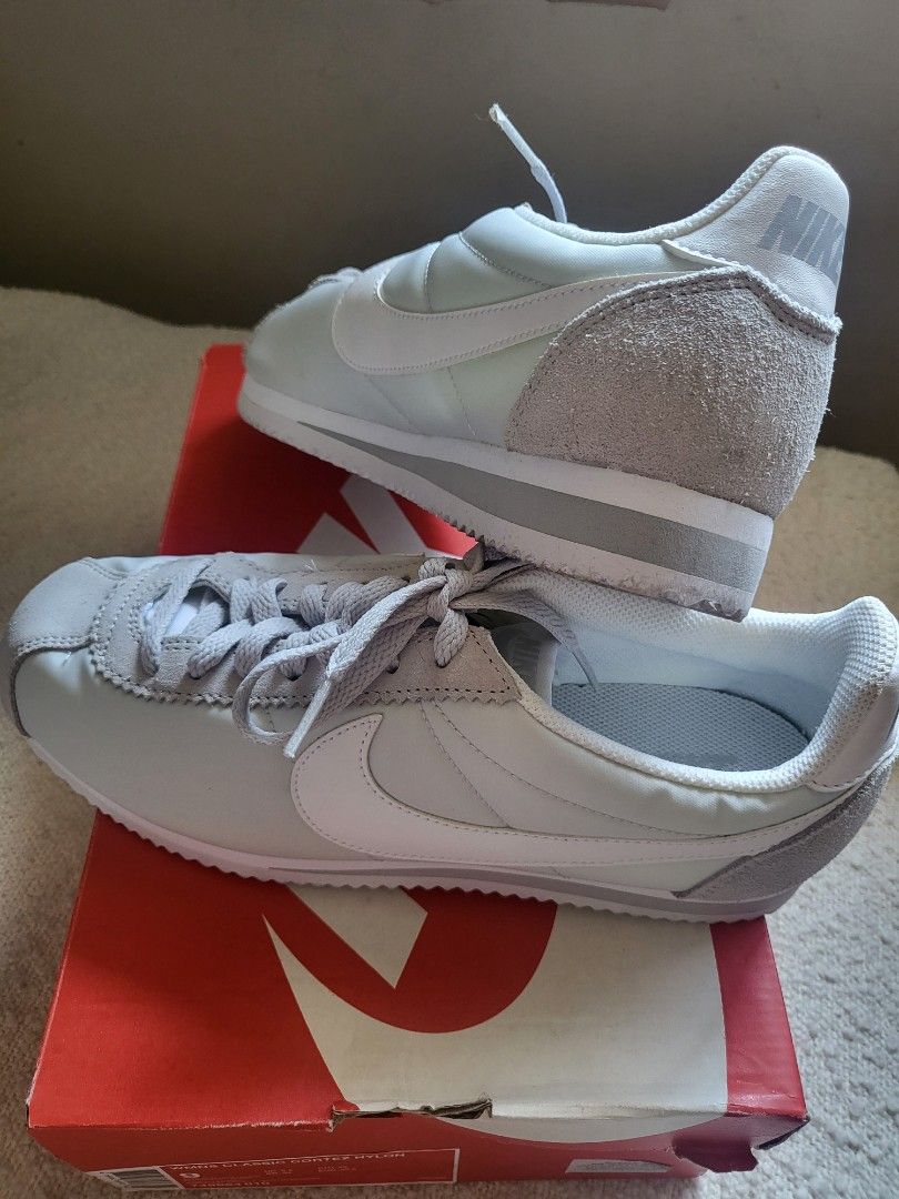 Nike WMNS Classic Cortez Nylon (Category: Sneakers) located in Muntinlupa City. Submitted by PeggyGirl (Listing ID 1440033555, Image 3). Description: - Authentic Nike WMNS Classic Cortez Nylon sneakers - Color: Pure Platinum/White - Classic silhouette with nylon and suede accents - Includes original Nike box - Size: 9 US Women's.