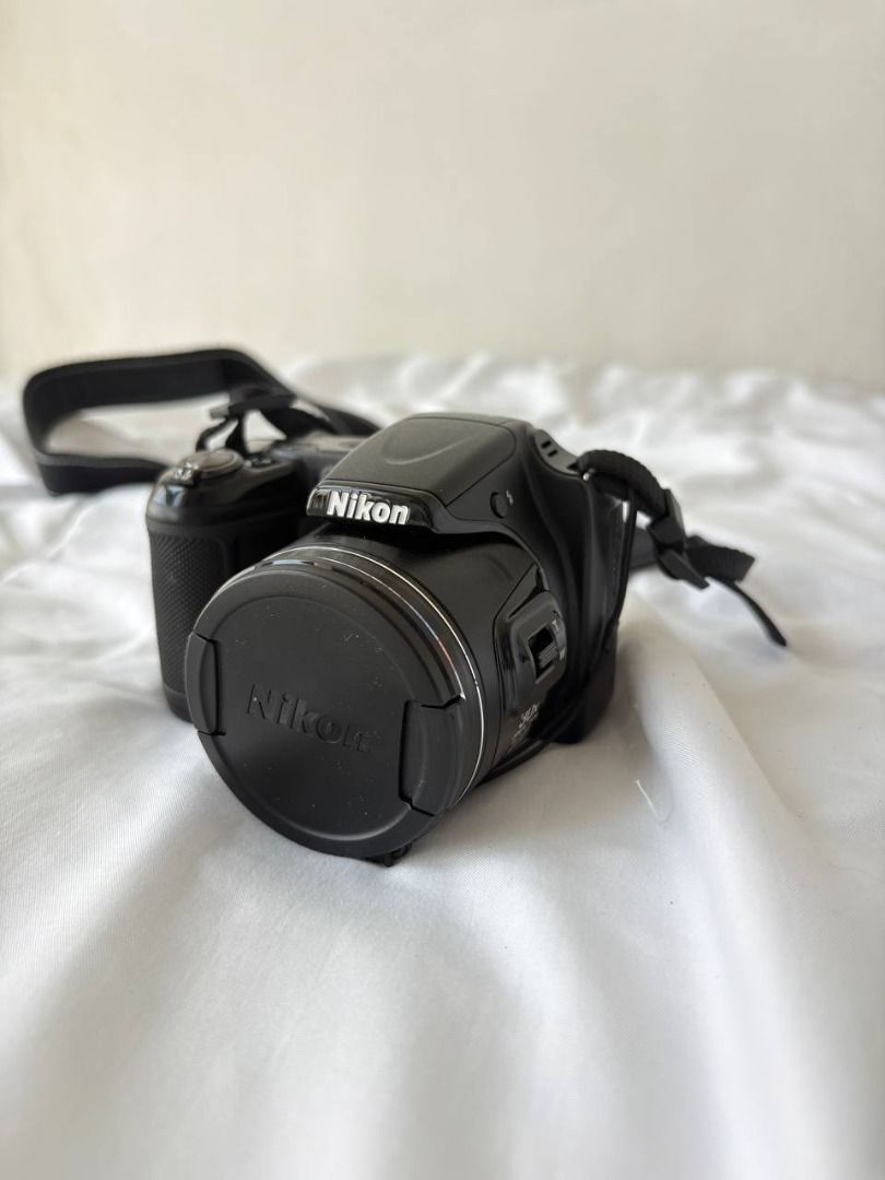 Nikon Coolpix L820 | Digital Camera with Strap and Pouch (Category: Cameras) located in Paranaque City. Submitted by __eej99 (Listing ID 1440040872, Image 2). Description: - Black Nikon Coolpix digital camera - Comes with original neck strap - Includes protective pouch with manual - Lens cap included - Ideal for everyday photography, good for beginners! - Still in good working condition RFS: Upgrading.