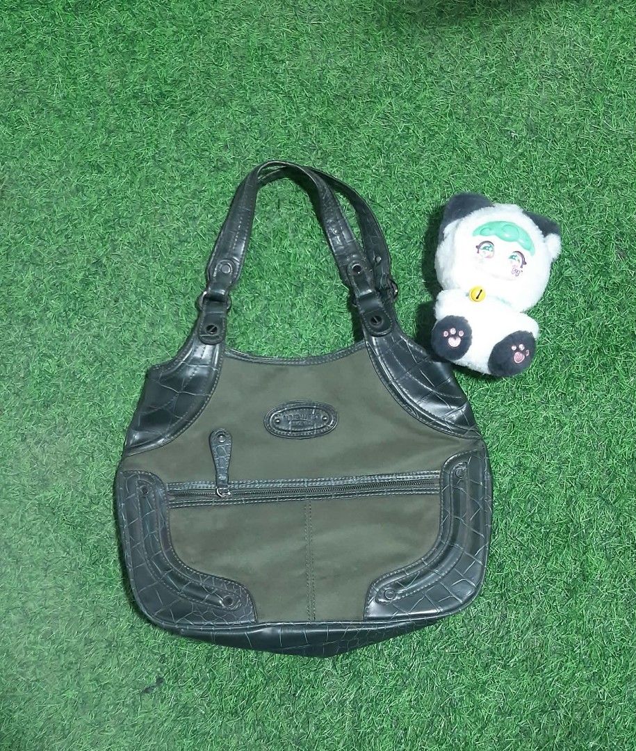 Nine West Shoulder Bag Crocodile Embossed Trim (Category: Luxury Bags & Wallets) located in Bulacan. Submitted by alfredcarp0905 (Listing ID 1439999562, Image 1). Description: - Stylish Nine West shoulder bag - Dark olive green color - Textured fabric with faux crocodile embossed leather trim - Front zippered pocket - Spacious main compartment with interior pockets - Comfortable shoulder straps.