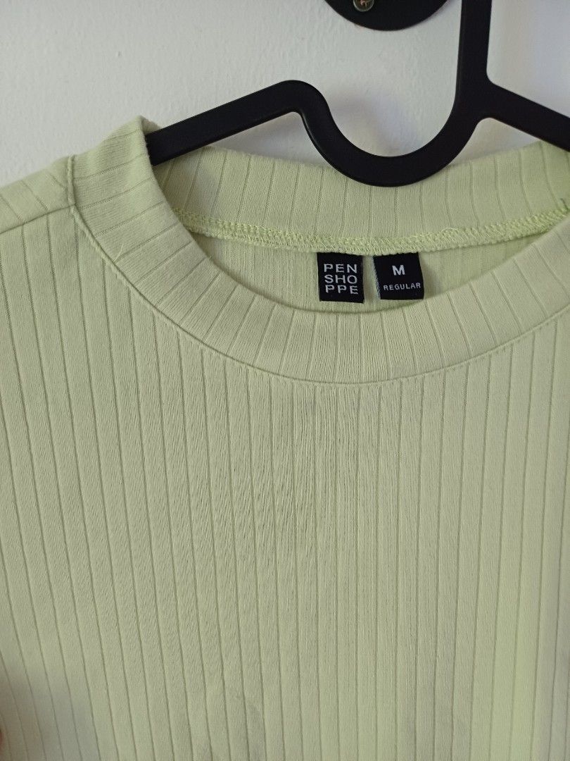 PENSHOPPE Ribbed T-shirt Light Green (Category: Shirts) located in Limay. Submitted by mjfvr (Listing ID 1440195113, Image 2). Description: *like new, lime color *jnt shipping only *gcash or bank transfer only *last price posted - Brand: PENSHOPPE - Color: Light Green - Style: Ribbed T-shirt - Features: Short sleeves, Crew neck - Occasion: Everyday casual wear - Pairing: Easily matches with jeans or shorts.