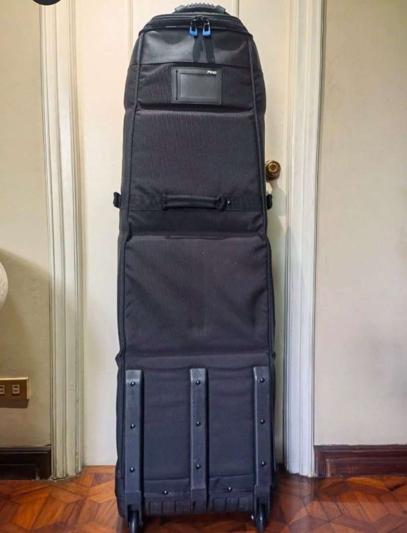 Ping Golf Travel Case Bag (Category: Golf) located in Pasig City. Submitted by partyonppl (Listing ID 1440084428, Image 1). Description: Almost brand new in perfect condition. Rugged, roomy, abrasion-resistant and maneuvers on a dime. The fortress your PING clubs deserve. ●Rugged 900D heathered grey polyester ●External dimensions: 53"Lx17"Wx14.5"D ●Fits carry bags up to full-size cart bags ● 6 handles for easy lifting from any angle ● Upright or 