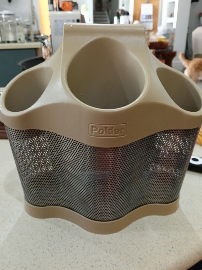 Polder Utensil Holder Caddy Organizer Beige (Category: Other Kitchenware & Tableware) located in Manila. Submitted by channah24796 (Listing ID 1439997105, Image 1). Description: - Polder utensil holder for kitchen organization - Multiple compartments for cutlery, spatulas, whisks - Perforated design for drainage and ventilation - Can be hung on a wall or placed on a countertop - A convenient kitchen addition.