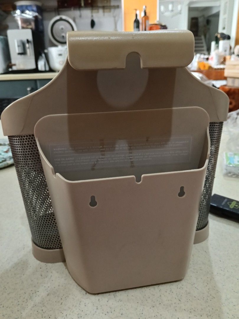 Polder Utensil Holder Caddy Organizer Beige (Category: Other Kitchenware & Tableware) located in Manila. Submitted by channah24796 (Listing ID 1439997105, Image 2). Description: - Polder utensil holder for kitchen organization - Multiple compartments for cutlery, spatulas, whisks - Perforated design for drainage and ventilation - Can be hung on a wall or placed on a countertop - A convenient kitchen addition.