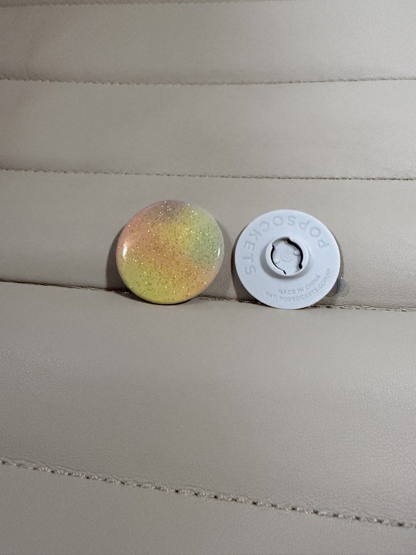 Popsockets Phone Grip Rainbow Glitter (Category: Other Mobile & Gadget Accessories) located in Paranaque City. Submitted by swiftstone_241dd3 (Listing ID 1440045669, Image 3). Description: - Adorable rainbow gradient design - Shimmering glitter for extra sparkle - Provides a secure grip for your phone - Collapsible and easy to carry - Adds personality and color to your device Reason for selling: decluttering Booking and payment for shipping c/o b