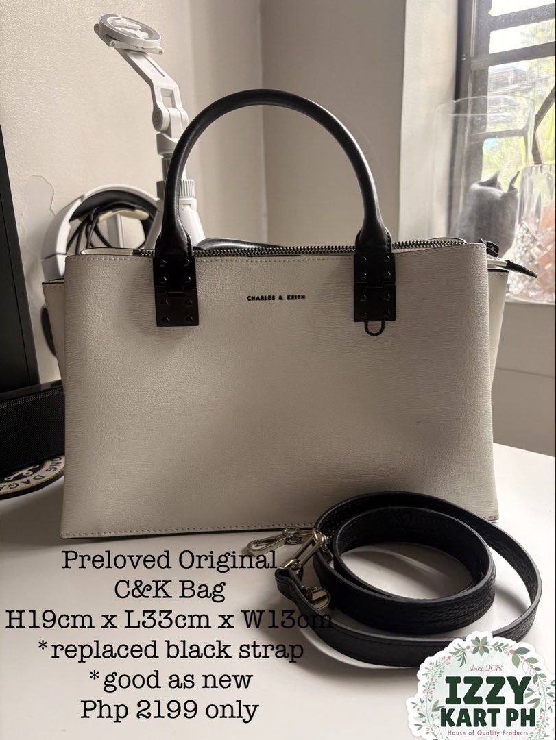 PRELOVED Original Charles and Keith White Bag (Category: Luxury Bags & Wallets) located in Caloocan City. Submitted by izzykartph (Listing ID 1440069959, Image 1). Description: Preloved Replaced bag strap Has minimal sign of usage In very good condition .