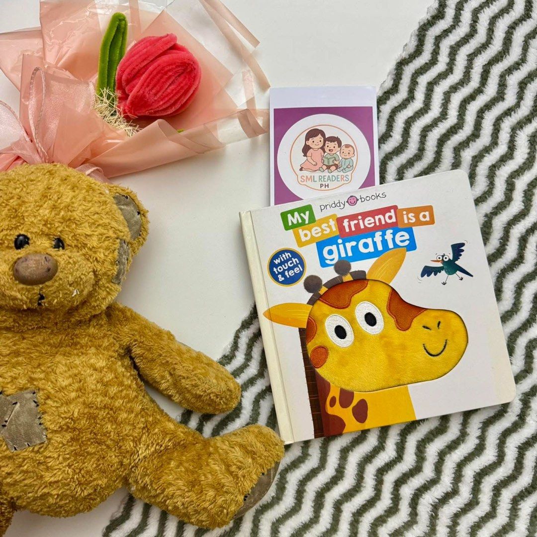 Priddy: My Bestfriend is a Giraffe (Category: Children's Books) located in Taguig. Submitted by smlreadersph (Listing ID 1440018451, Image 1). Description: 🦒💛 𝐌𝐲 𝐁𝐞𝐬𝐭𝐟𝐫𝐢𝐞𝐧𝐝 𝐈𝐬 𝐚 𝐆𝐢𝐫𝐚𝐟𝐟𝐞 Author/Illustrator: Sian Roberts | Priddy Books 📖 Condition: Preloved with minimal signs of use; touch-and-feel elements intact 👧👦 Age Recommended: 0–3 years 📘 About the Book: An adorable interactive touch-and-feel board book that intro