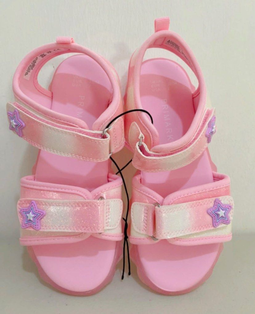 Primark Pink Star Glitter Sandals with LIGHTS (Category: Babies & Kids Fashion) located in Mandaluyong City. Submitted by kickzforkidz (Listing ID 1440187254, Image 2). Description: Primark from US Pink Sandals with Malakas na Lights Magaan sya and Malambot yung apakan. Last Pair Available 21cm sya sa medida, then sa tags nga euro33/34 i will send the video of the light just message me po..