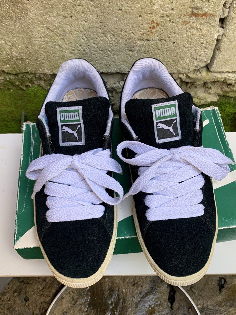 Puma Suede Classic Black White Sneakers (Category: Sneakers) located in Bacoor. Submitted by yaku.thrift (Listing ID 1440170318, Image 1). Description: - Classic Puma Suede sneakers -size 9 verygood condition - Color: Black with white laces - Features iconic Puma logo on tongue and side - Includes original Puma box - Ideal for everyday wear and versatile styling.