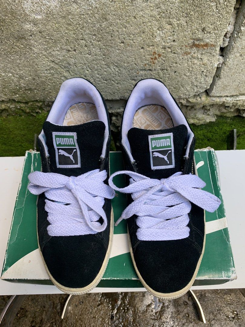 Puma Suede Classic Black White Sneakers (Category: Sneakers) located in Bacoor. Submitted by yaku.thrift (Listing ID 1440170318, Image 2). Description: - Classic Puma Suede sneakers -size 9 verygood condition - Color: Black with white laces - Features iconic Puma logo on tongue and side - Includes original Puma box - Ideal for everyday wear and versatile styling.